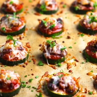 Delicious low-calorie, zucchini pizza bites without the carbs! Great for a healthy snack or football game day appetizer! Vegetarian and gluten-free.