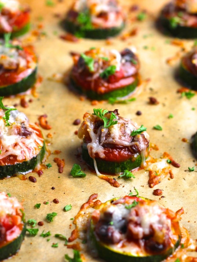 Delicious low-calorie, zucchini pizza bites without the carbs! Great for a healthy snack or football game day appetizer! Vegetarian and gluten-free.