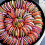 Zucchini tomato pesto bake (similar to ratatouille) is so delicious and easy to make! It's easy to be fancy with this healthy side dish recipe!