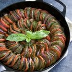 Zucchini tomato pesto bake (similar to ratatouille) is so delicious and easy to make! It's easy to be fancy with this healthy side dish recipe!