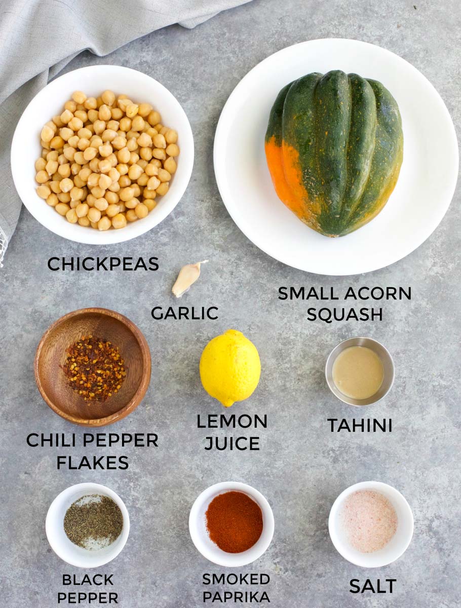 All of the ingredients needed to make the recipe laid out on a gray background.