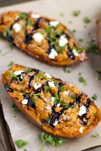 Goat cheese crumbles, sautéed balsamic onions and twice baked sweet potatoes make the perfect side dish or vegetarian dinner! #cleaneating #goatcheese #sidedish #sweetpotatoes #vegetarian