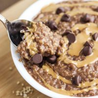 Easy chocolate peanut butter oatmeal, made overnight in the crockpot.