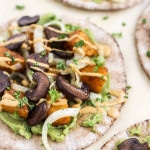 Spicy roasted butternut squash, sautéed onions, mashed avocado, and portobello mushrooms, on a pita, with a chipotle yogurt sauce.