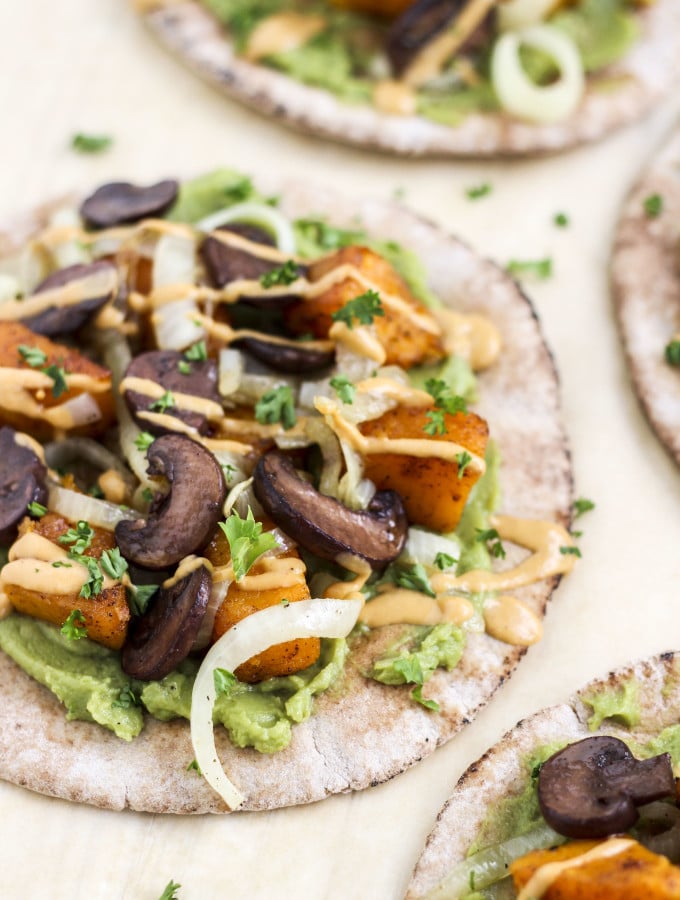 Spicy roasted butternut squash, sautéed onions, mashed avocado, and portobello mushrooms, on a pita, with a chipotle yogurt sauce.