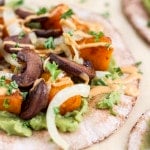 Spicy roasted butternut squash, sautéed onions, mashed avocado, and portobello mushrooms, on a pita, with a chipotle yogurt sauce.