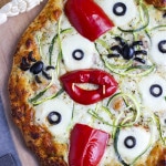 Everything you might find in a graveyard has made its way into this devilishly spooky pizza! Use a frozen pizza for the base but scare it up with eyeballs, spiders, tongues, vampire fangs, and worms for your kids before you go out trick or treating on Halloween!