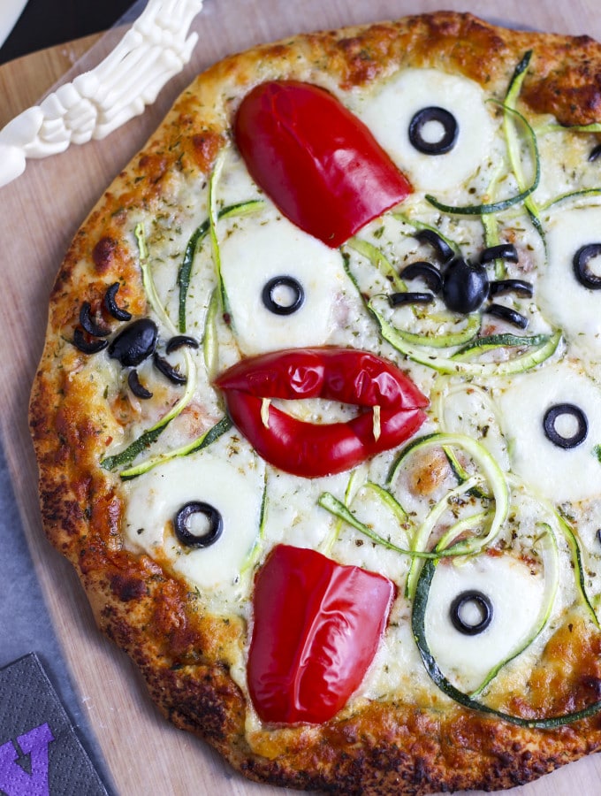 Everything you might find in a graveyard has made its way into this devilishly spooky pizza! Use a frozen pizza for the base but scare it up with eyeballs, spiders, tongues, vampire fangs, and worms for your kids before you go out trick or treating on Halloween!