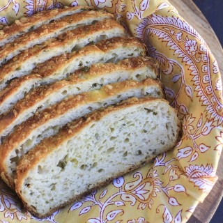 Cheesy no-knead cheddar onion bread is my favorite bread to use for toast & sandwiches! Only 5 minutes of hands on prep!