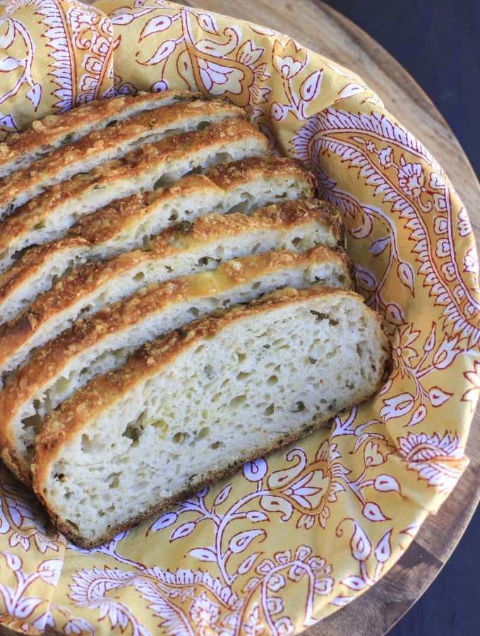 Cheesy no-knead cheddar onion bread is my favorite bread to use for toast & sandwiches! Only 5 minutes of hands on prep!