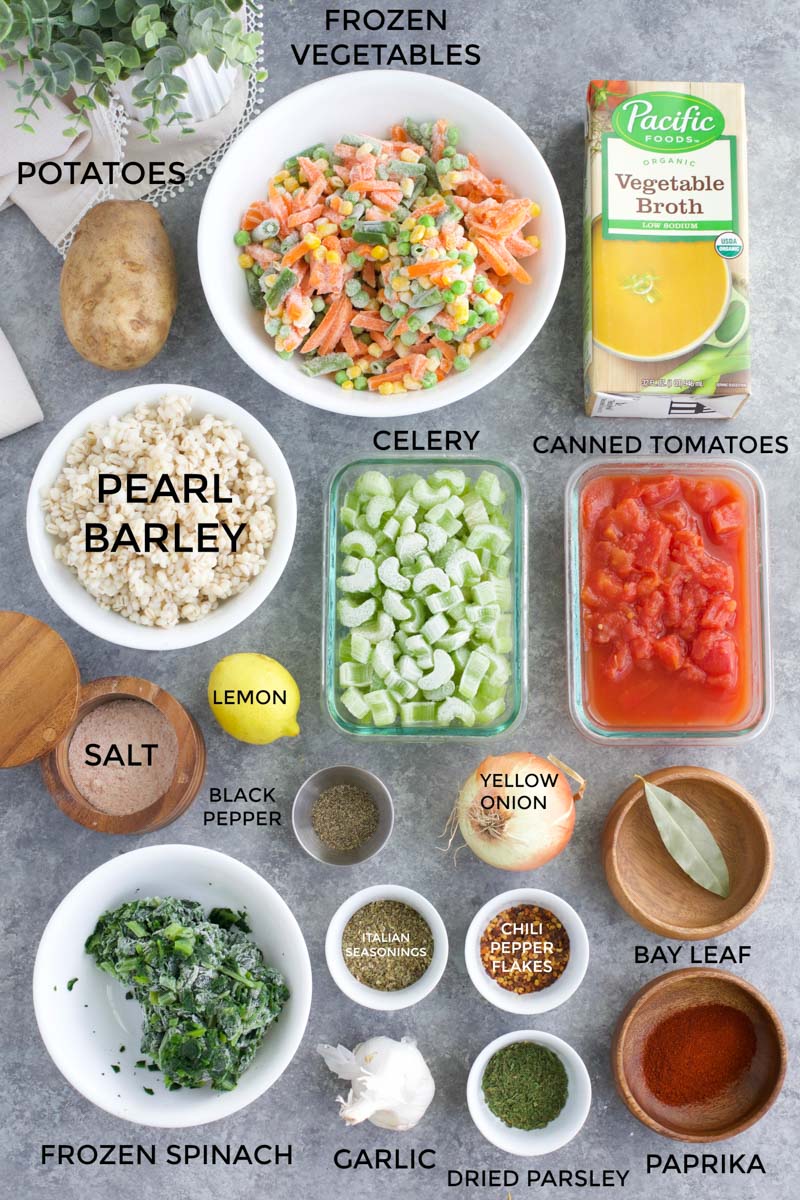 All of the ingredients needed to make the recipe laid out on a gray background.