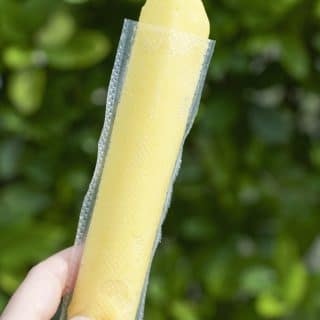 Make your own mango popsicles with only 2 wholesome ingredients! These popsicles are refined sugar free and require only a few minutes to assemble using a FoodSaver vacuum. The perfect summer treat that everyone will love and you can feel good about eating! Dairy-free.