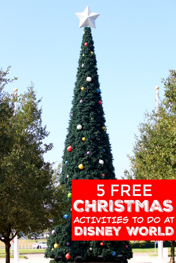 The Contemporary Resort Christmas tree outside of its hotel with a sign that says, "5 free Christmas activities to do at Disney World!"