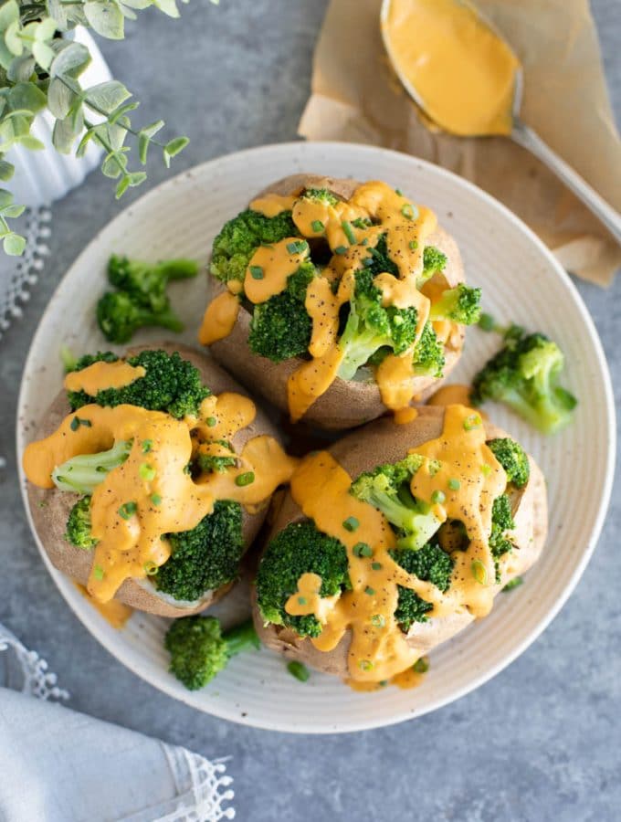 I love to slather these purple sweet potatoes with the vegan cheese sauce-- it's seriously delicious!