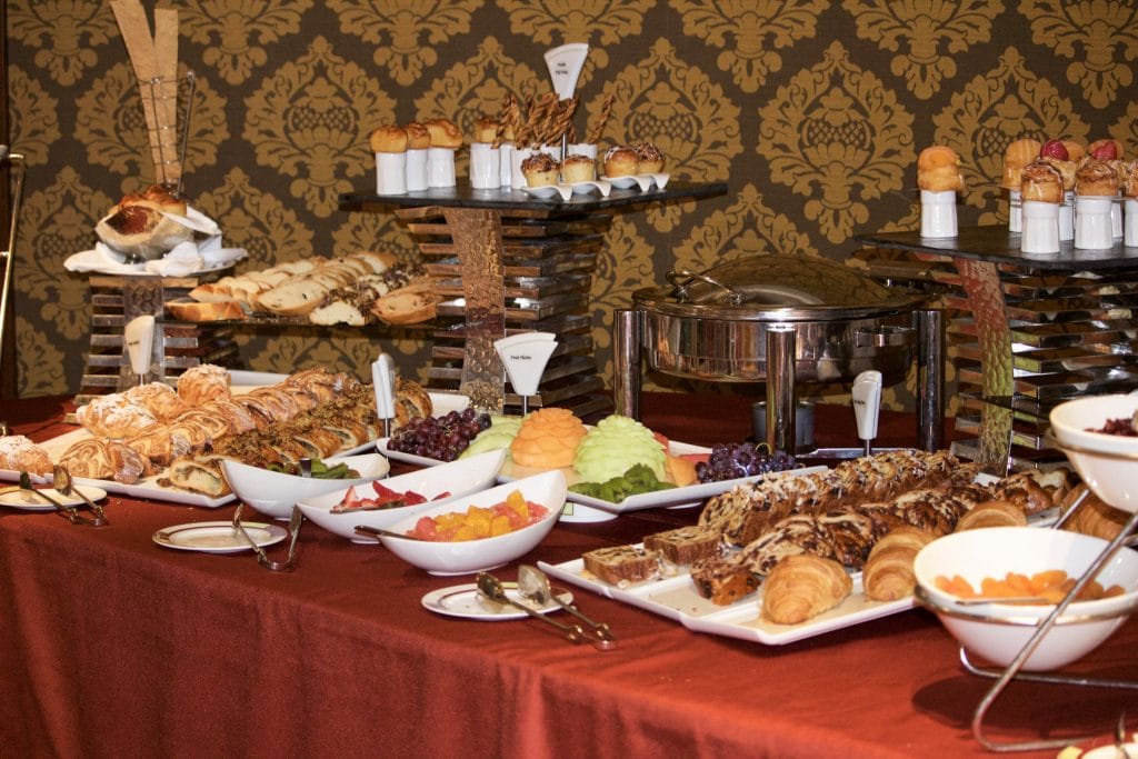 Multiple platters of food at the Palo brunch buffet on the Disney Fantasy.