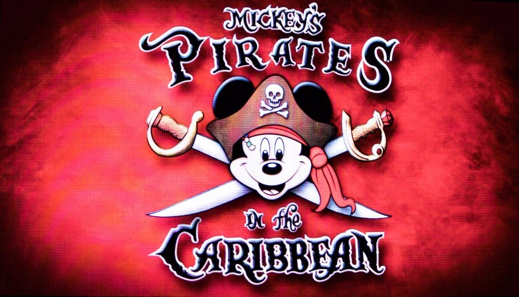 Mickey's Pirates in the Caribbean logo on a red background. 