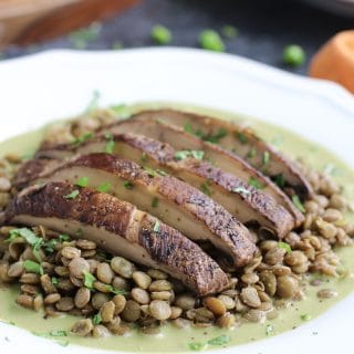 I had these delicious roasted portobello mushrooms with green pea pesto lentils for dinner on a Disney cruise. The recipe turned out even better at home! It's omnivore and vegan approved and ready in 30 minutes! Vegan, dairy-free & gluten-free.