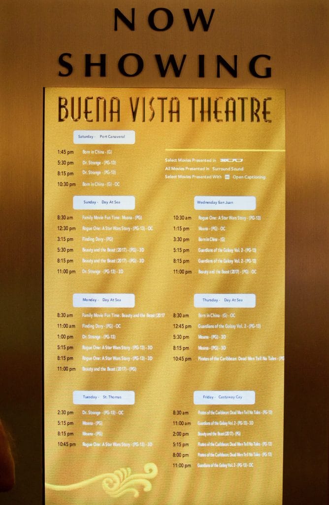 A sign with movie times at the buena vista theatre on the Disney Fantasy.
