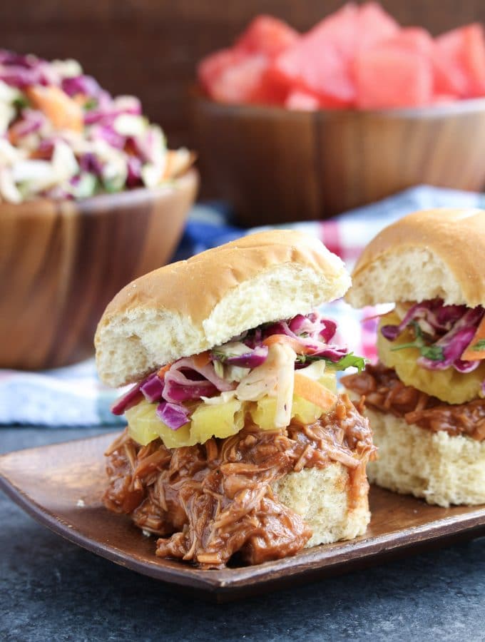 Your friends and family won't believe it when they try this vegan pulled pork recipe and realize that its not really meat! It's that good! Sweet, tangy whiskey pineapple BBQ sauce + slow cooker + pulled jackfruit = heaven!