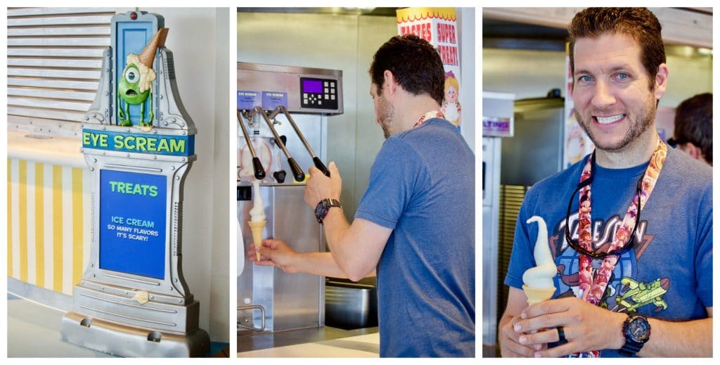 A man getting an ice cream cone from he eye scream machine on a Disney cruise. 