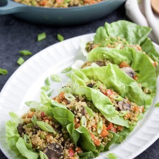 Try this veggie-loaded 30-minute easy quinoa fried rice for a quick and delicious dinner that the whole family will love! You can serve it hot or cold, by itself or in lettuce wraps! Vegan, dairy-free, gluten-free.Â