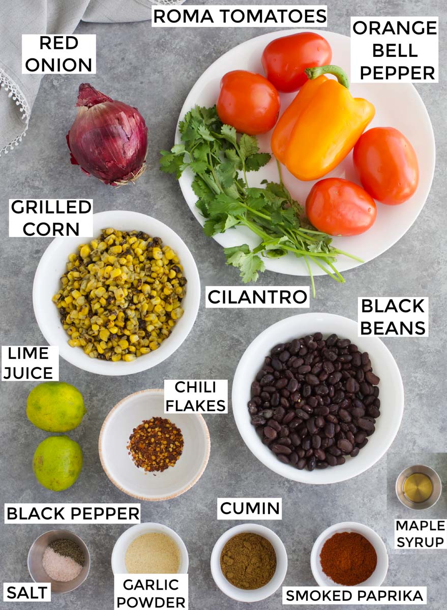 All of the ingredients needed to make the recipe laid out and labeled on a gray background.