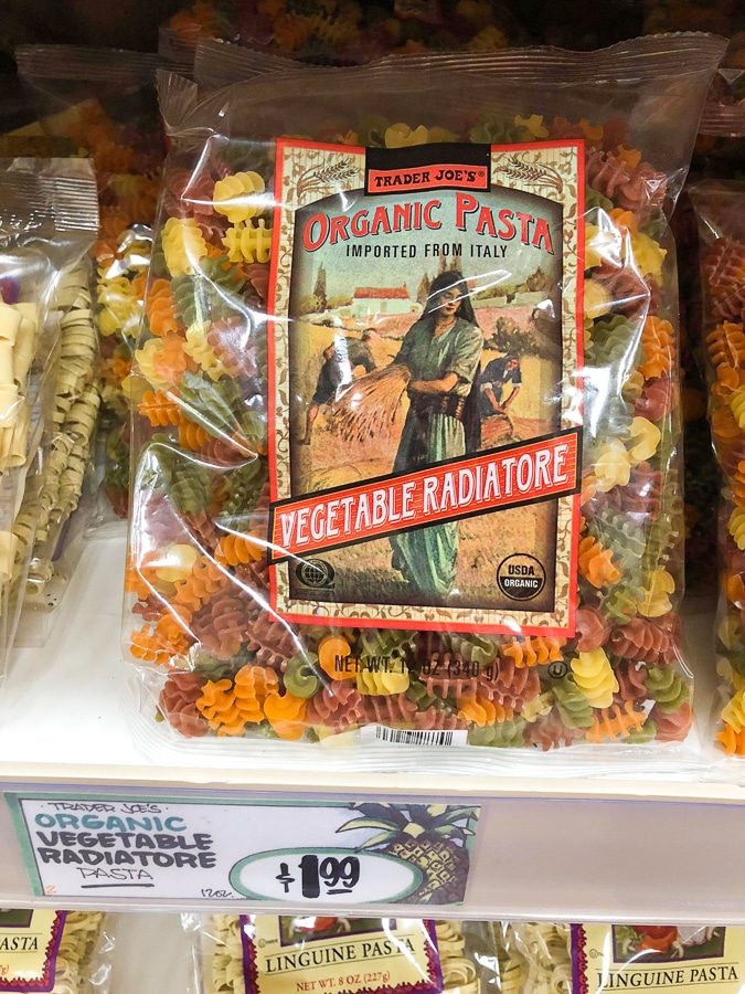 A bag of organic vegetable pasta for $1.99 on the shelf at Trader Joe's. 