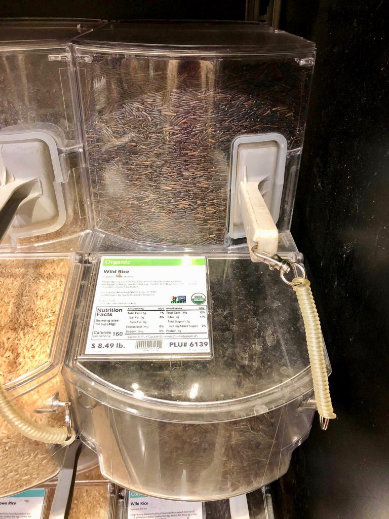 A bulk container of organic wild rice at Whole Foods Market.
