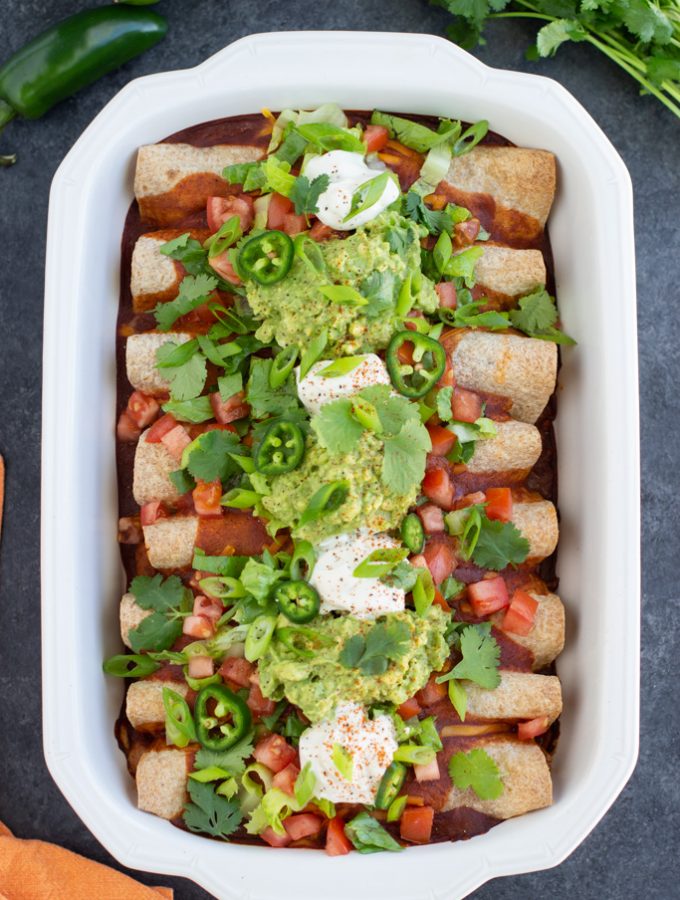 Vegan enchiladas with toppings