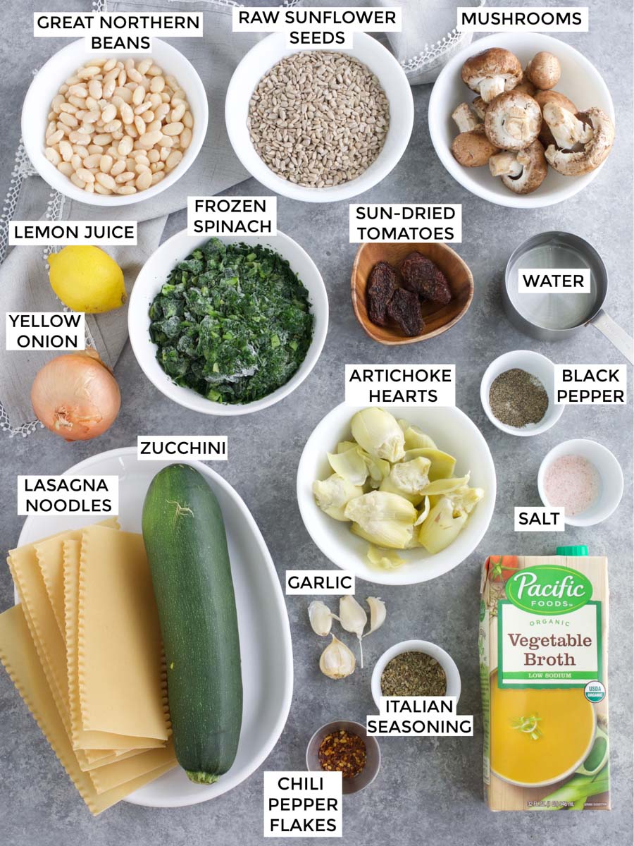 All of the ingredients needed to make the recipe laid out on a gray background.