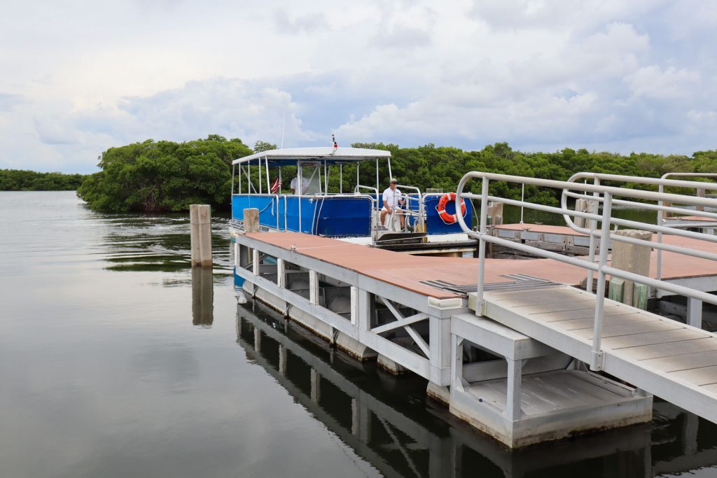 The Caladesi Island ferry pulling up to the dock. 