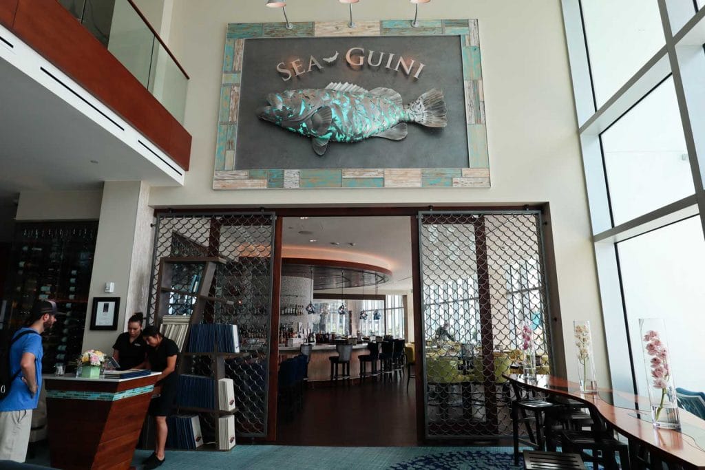 The entrance to Sea-Guini restaurant at Opal Sands on Clearwater beach. 