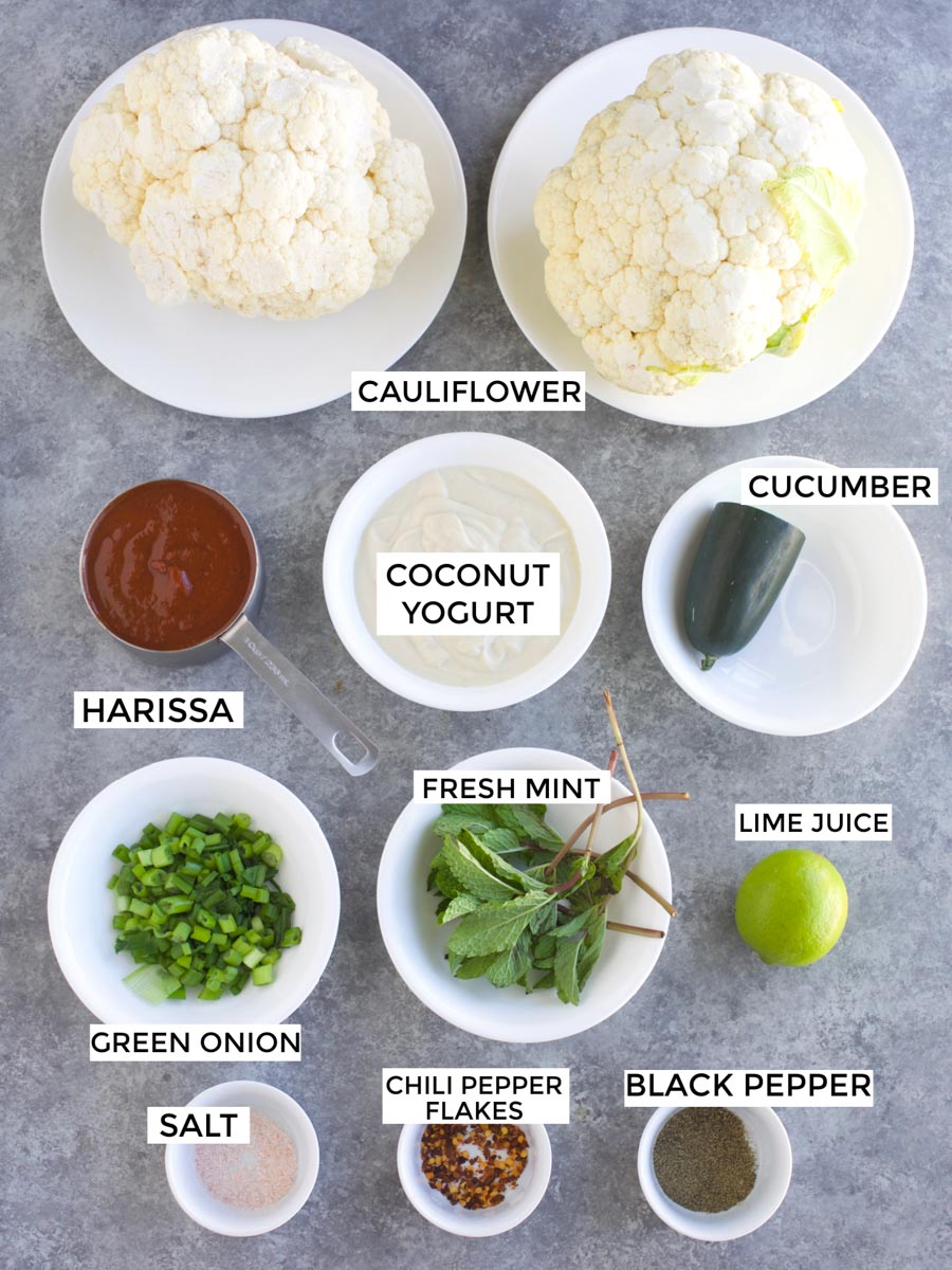 All of the ingredients needed to make the recipe laid out on a gray background.