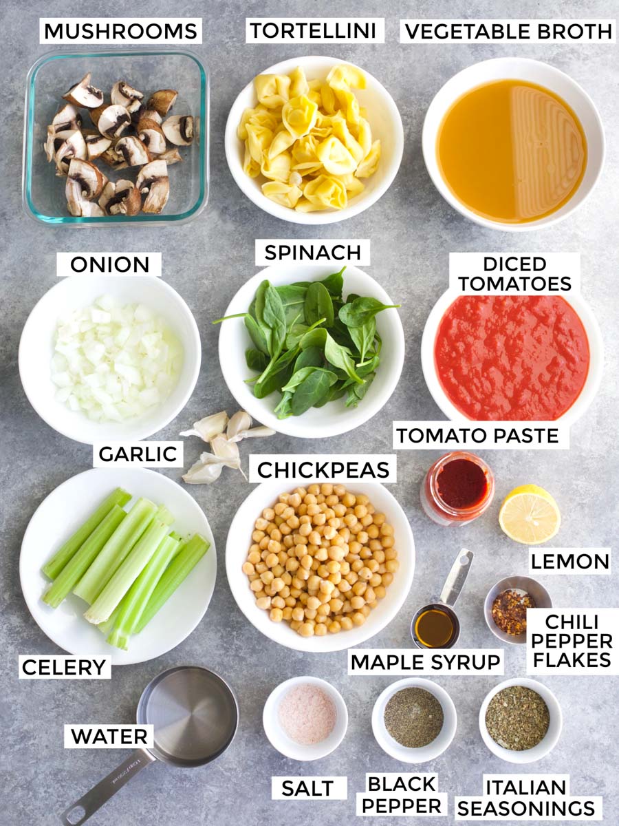 All of the ingredients needed to make the recipe laid out on a gray background. 